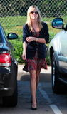 th_93782_Preppie_-_Reese_Witherspoon_at_the_Neil_George_Salon_in_Beverly_Hills_-_Jan._12_2010_9204_122_392lo.JPG
