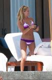 th_23033_Ashley_Tisdale_Vacation_in_Cabo_San_Lucas_November_16_2009_018_122_414lo.jpg